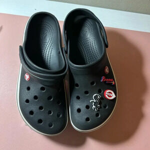 CROCS Black Clogs with Sports Charms